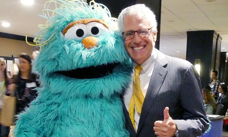 Gary Knell and Rosita smile for a quick pic at the 2018 National Training Seminar.